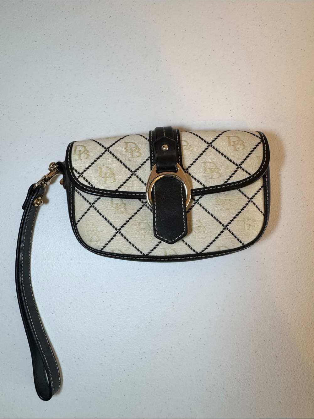 Dooney & Bourke Cream and navy Wristlet with Logo Diamond Pattern